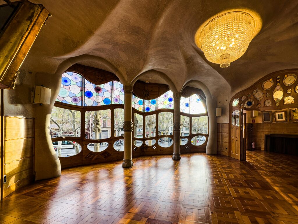 Ornate interior of Casa Batlló in Barcelona showcasing Gaudí's unique architecture.